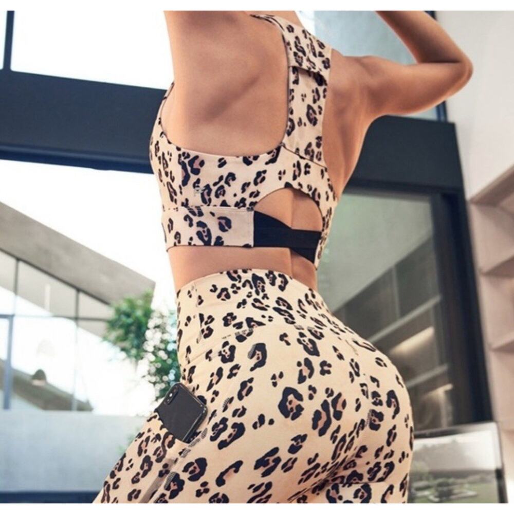 Fabletics on the go medium- Impact Sports Bra Leopard Cheetah Size Medium